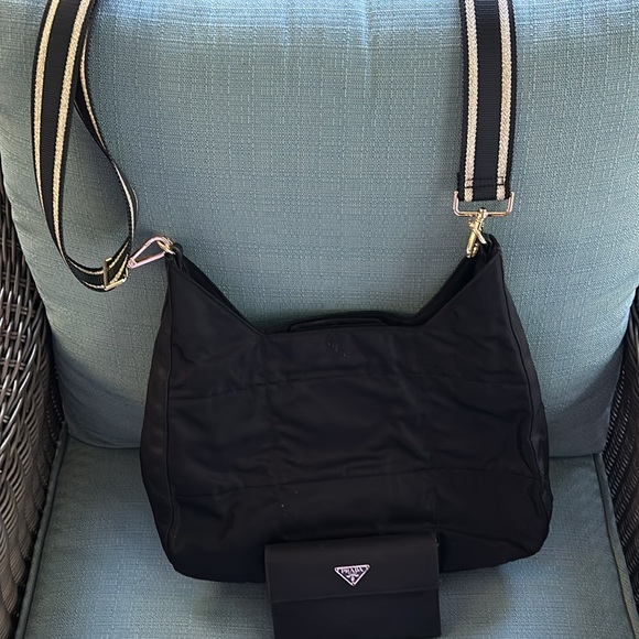 This is a black Prada crossbody with matching wallet. - Picture 8 of 8